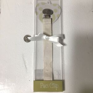 Silver tone Cross clip pacifier leash from Main Street Collection